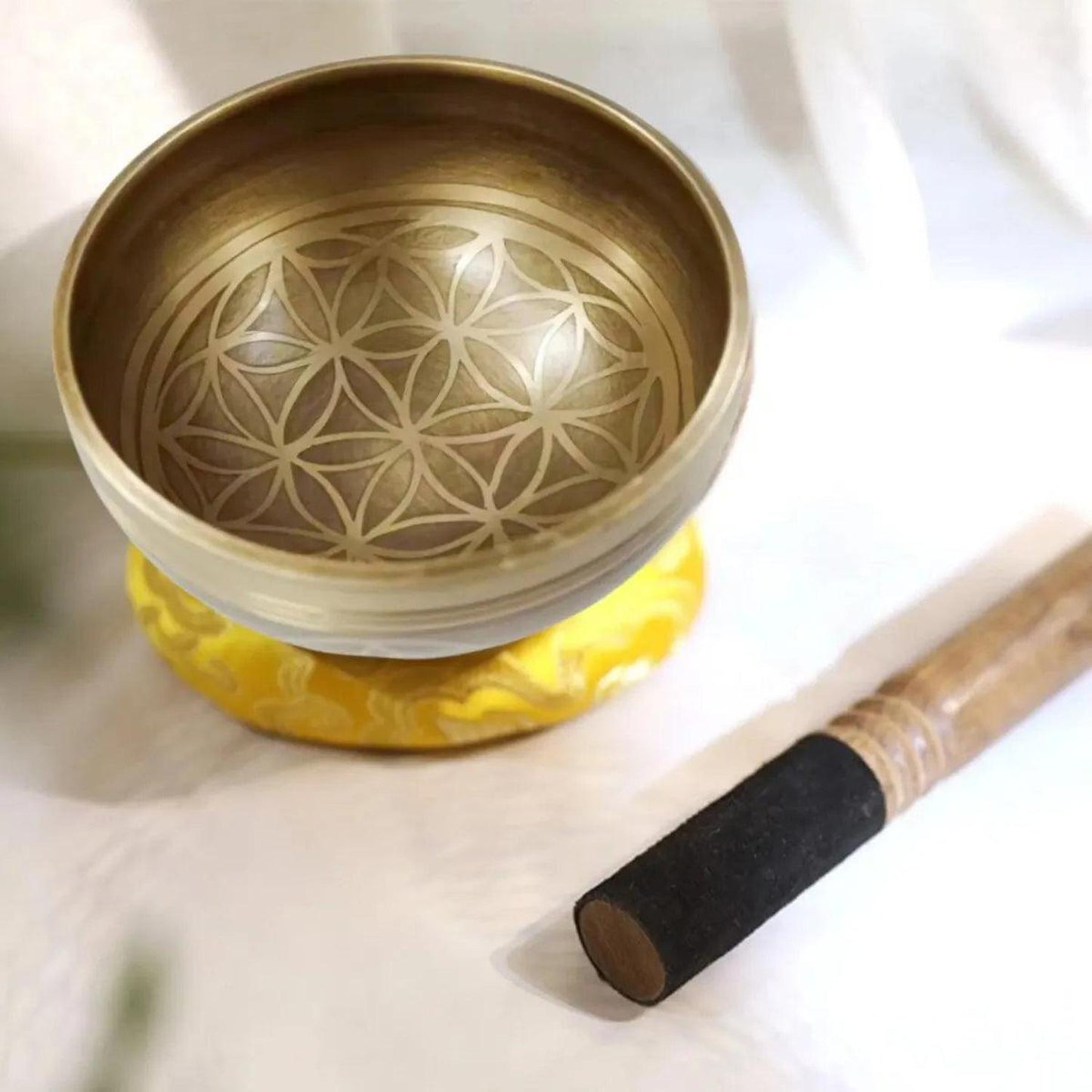 Tibetan Singing Bowl Set - Hand-Hammered for Meditation & Stress - Authentic 3.3-inch Tibetan Singing Bowl set with Flower of Life symbol. Hand-crafted in Nepal for meditation, stress relief, and sound healing. Buy Now at Sacred Remedy
