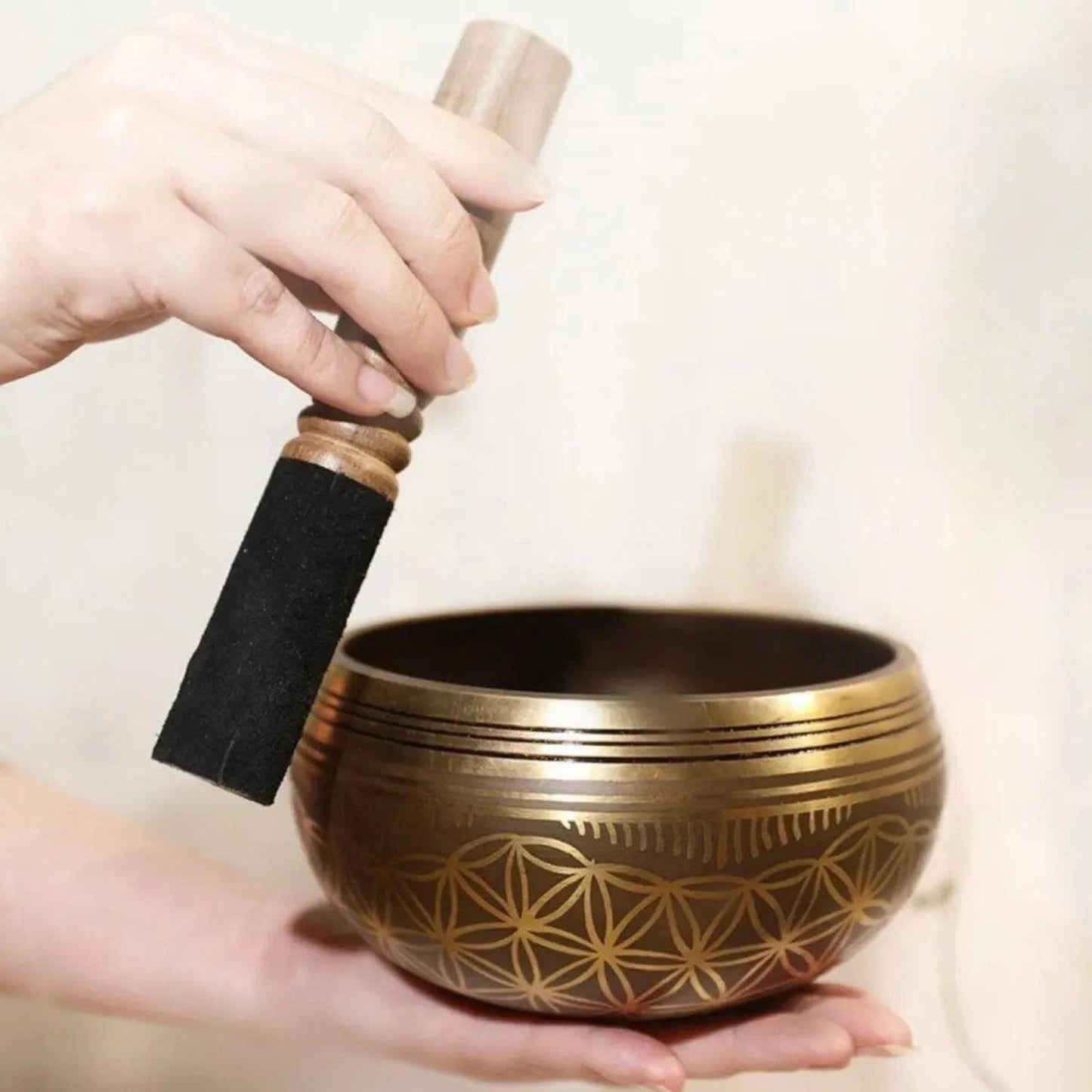 Tibetan Singing Bowl Set - Hand-Hammered for Meditation & Stress - Authentic 3.3-inch Tibetan Singing Bowl set with Flower of Life symbol. Hand-crafted in Nepal for meditation, stress relief, and sound healing. Buy Now at Sacred Remedy