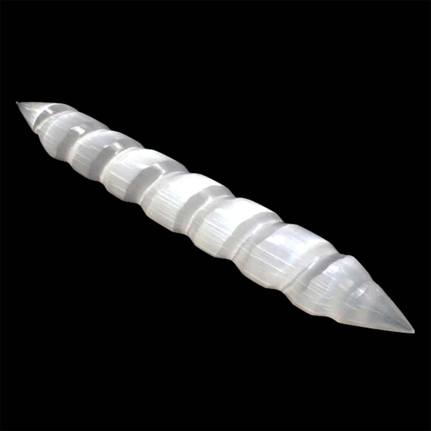 Selenite Spiral Double Point Massage Wand | Aura Combing - It is generally accepted that Selenite is one of the most powerful crystals for healing. Also it is connecting to the third eye, crown and etheric chakras. Some say it promotes purity and honesty. It is said it forces the person holding it to be honest with themselves. Buy Now at Sacred Remedy