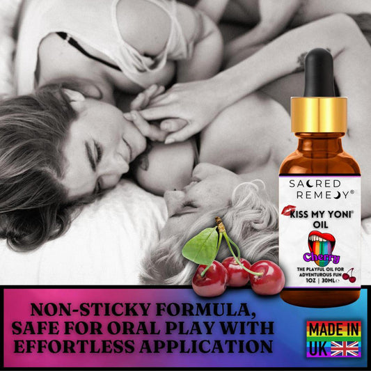 Amber glass dropper bottle of Kiss My Yoni Cherry oil with a label featuring red lips and fresh cherries.
