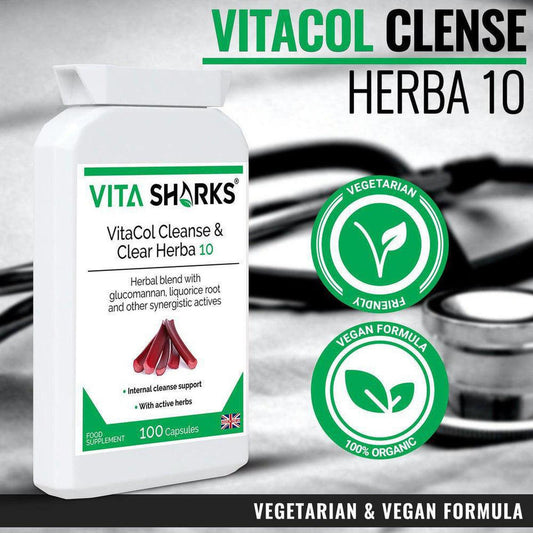 White bottle of VitaCol Cleanse Herba 10 capsules with green labels, vegan and organic seals, and a blurred medical background.