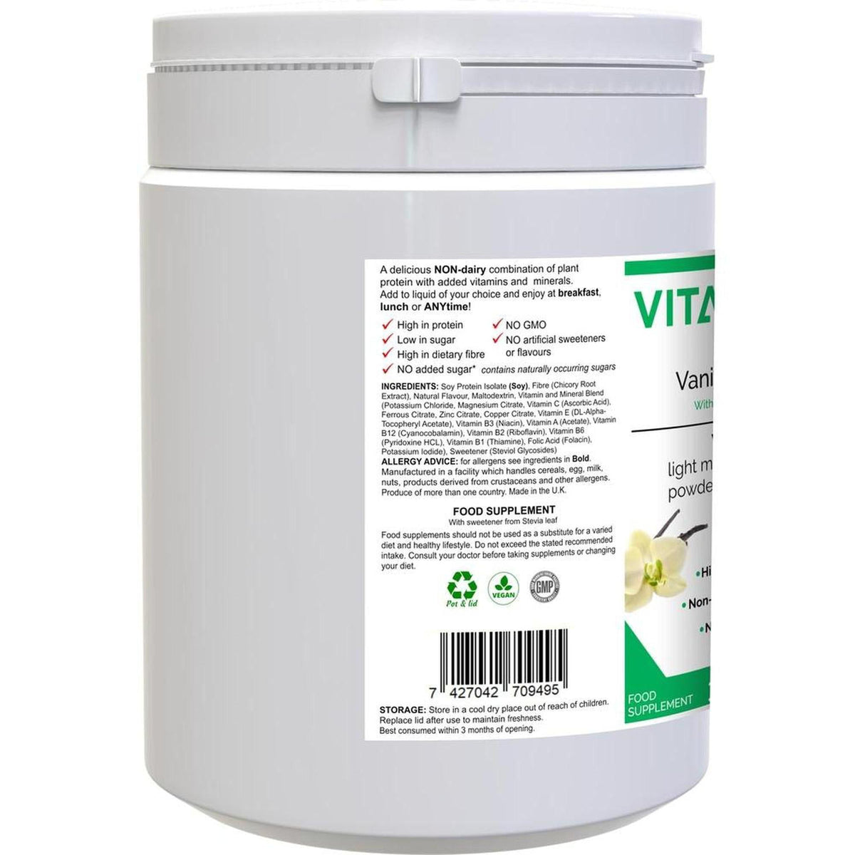 White VitaDiet Vanilla Meal Shake tub featuring a detailed nutritional label, ingredient list, and green branding accents.