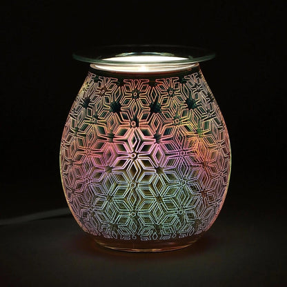 3D glass electric wax melt burner with a glowing, multicolored sacred geometry pattern on a dark background.