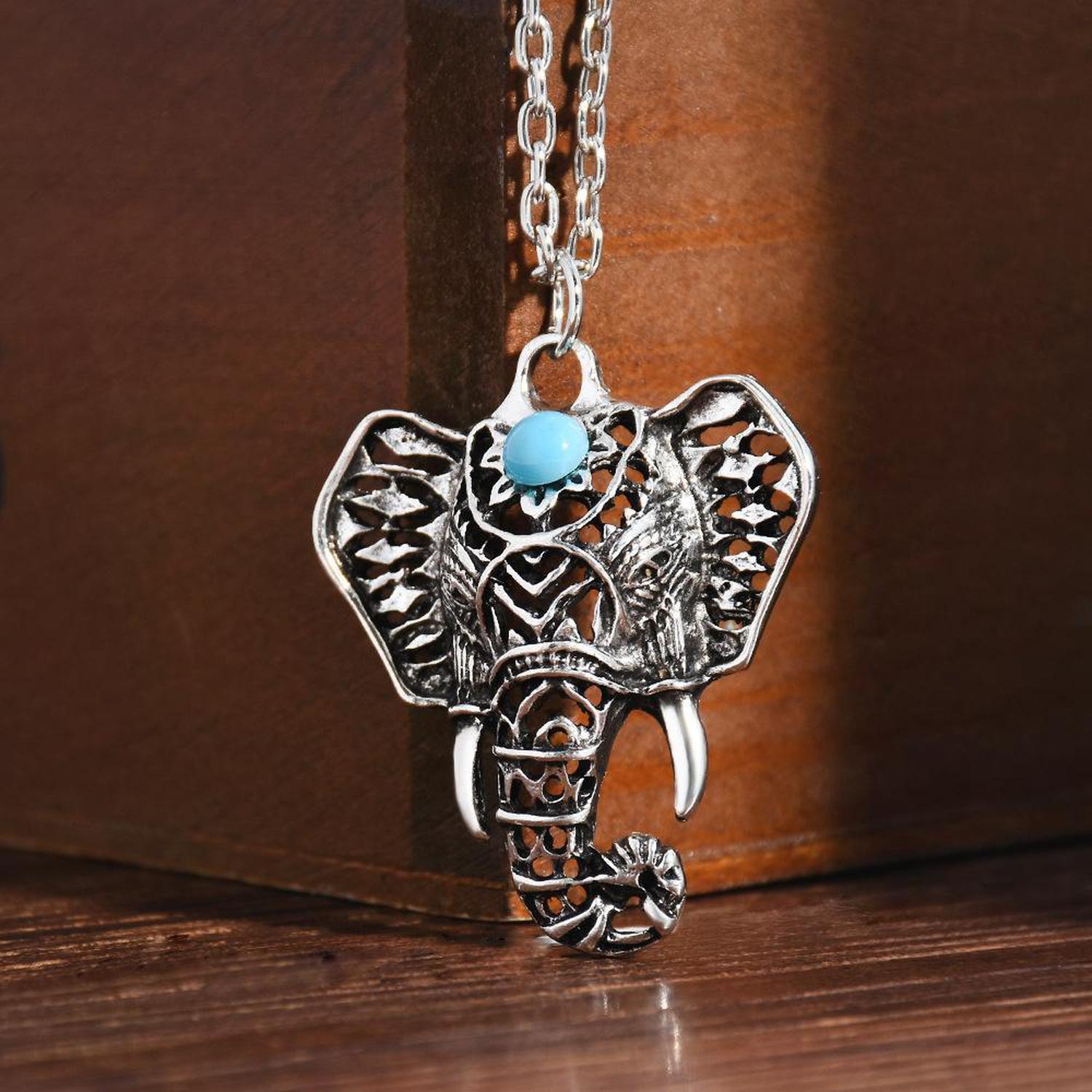 Blue Stone Elephant Necklace | Reiki Infused - Handmade, silver-plated Blue Stone Elephant Necklace. Infused with Reiki for good luck, wisdom & strength. Boho-mystic style & anti-allergen. Buy Now at Sacred Remedy