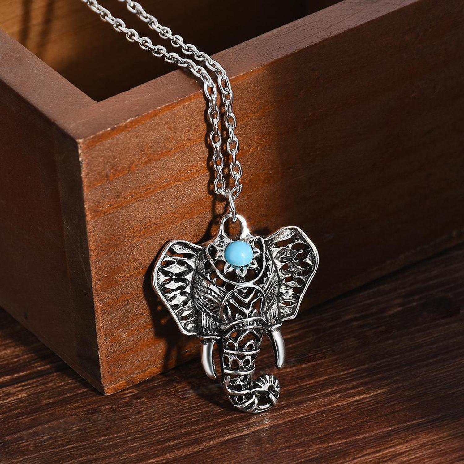 Blue Stone Elephant Necklace | Reiki Infused - Handmade, silver-plated Blue Stone Elephant Necklace. Infused with Reiki for good luck, wisdom & strength. Boho-mystic style & anti-allergen. Buy Now at Sacred Remedy
