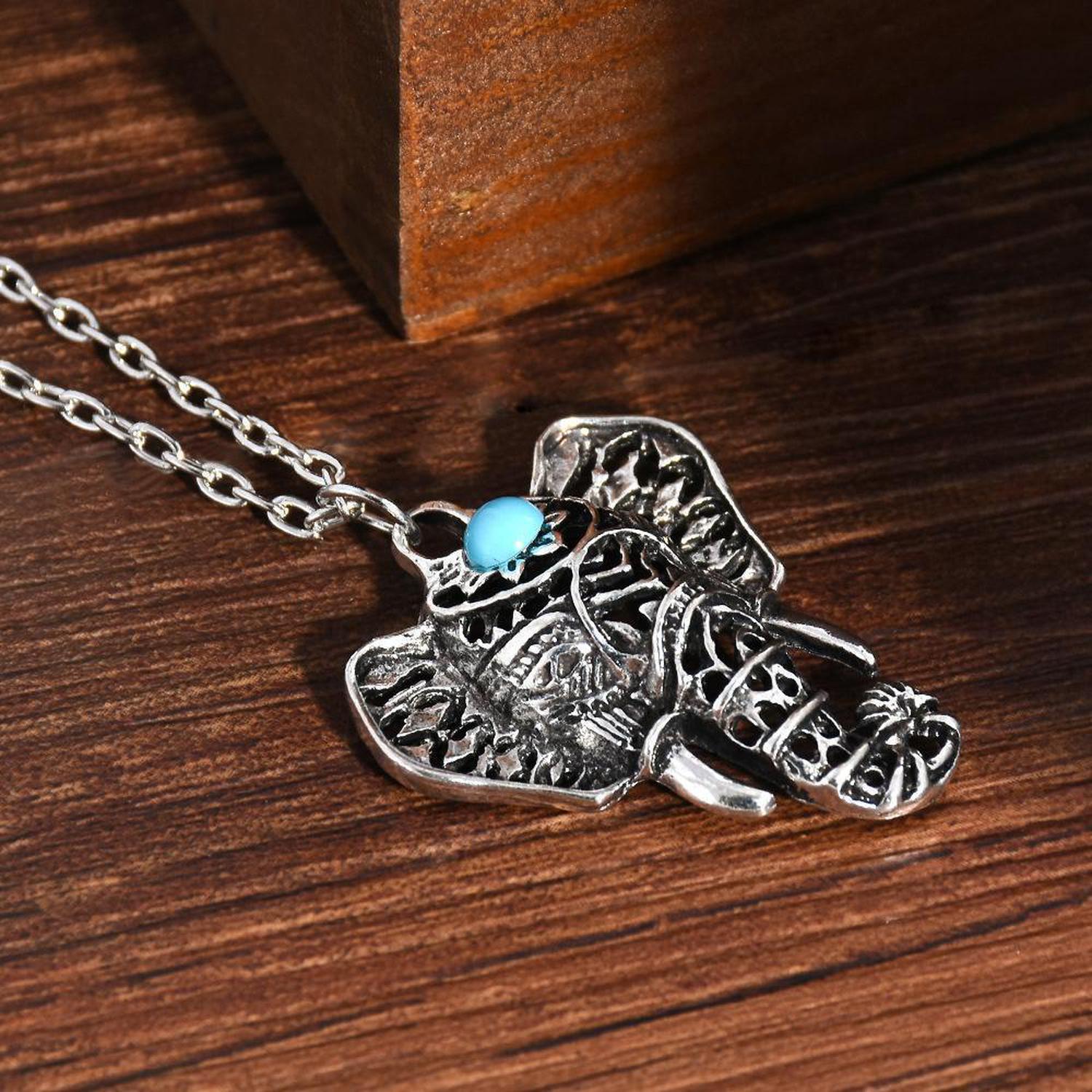 Blue Stone Elephant Necklace | Reiki Infused - Handmade, silver-plated Blue Stone Elephant Necklace. Infused with Reiki for good luck, wisdom & strength. Boho-mystic style & anti-allergen. Buy Now at Sacred Remedy