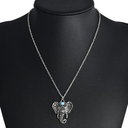 Blue Stone Elephant Necklace | Reiki Infused - Handmade, silver-plated Blue Stone Elephant Necklace. Infused with Reiki for good luck, wisdom & strength. Boho-mystic style & anti-allergen. Buy Now at Sacred Remedy