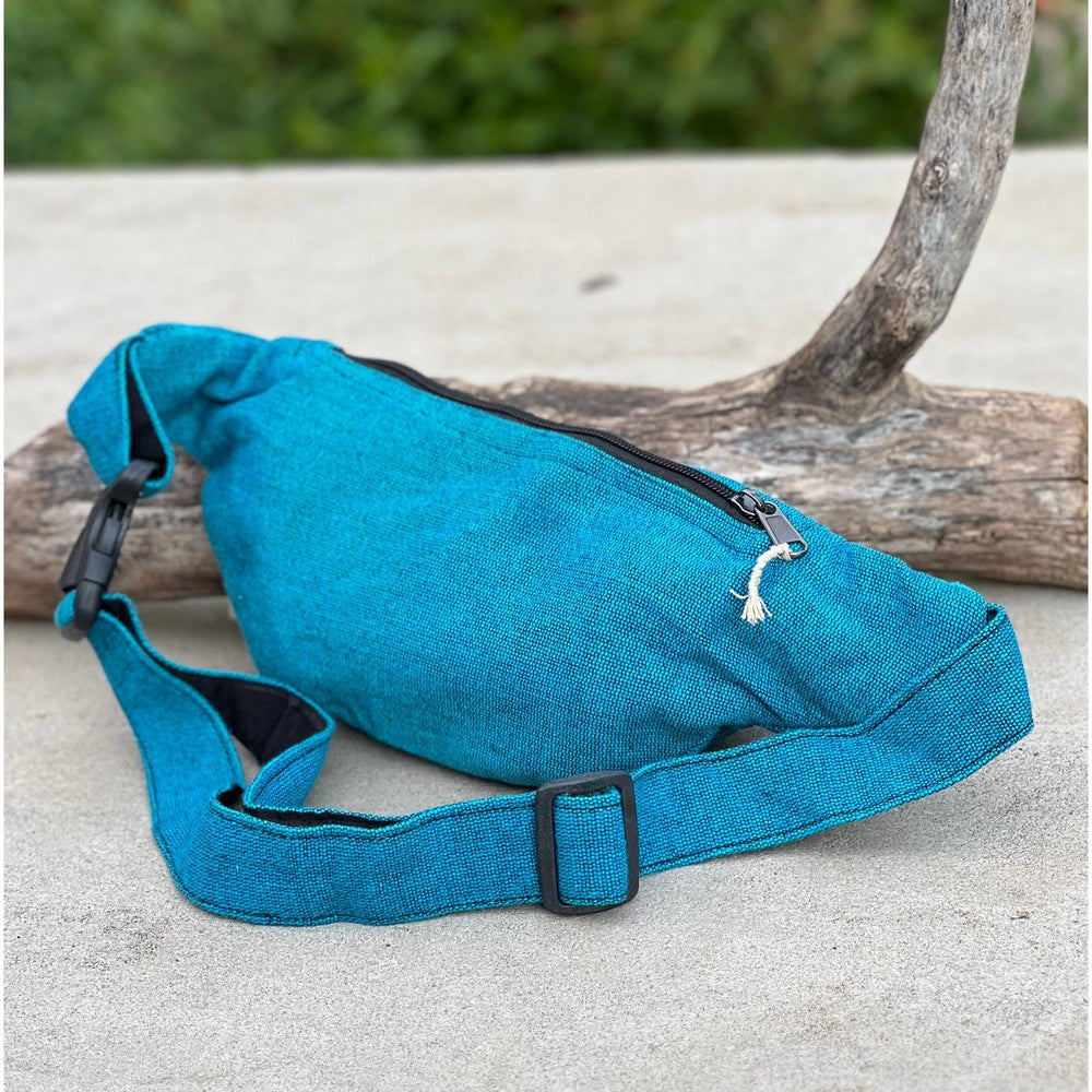 Buy Eco-Friendly Boho Hippie Style Hemp Fanny Pack Hip Waist Bag: Turquoise Blue - Made in Nepal from high-quality, sustainable hemp fabric, our fanny packs are not only durable but also environmentally friendly. Perfect for all your essentials – phone, wallet, keys, passport, etc. Great gift for your loved ones who enjoy activities like travelling, walking, running, hiking, biking, camping etc. at Sacred Remedy Online