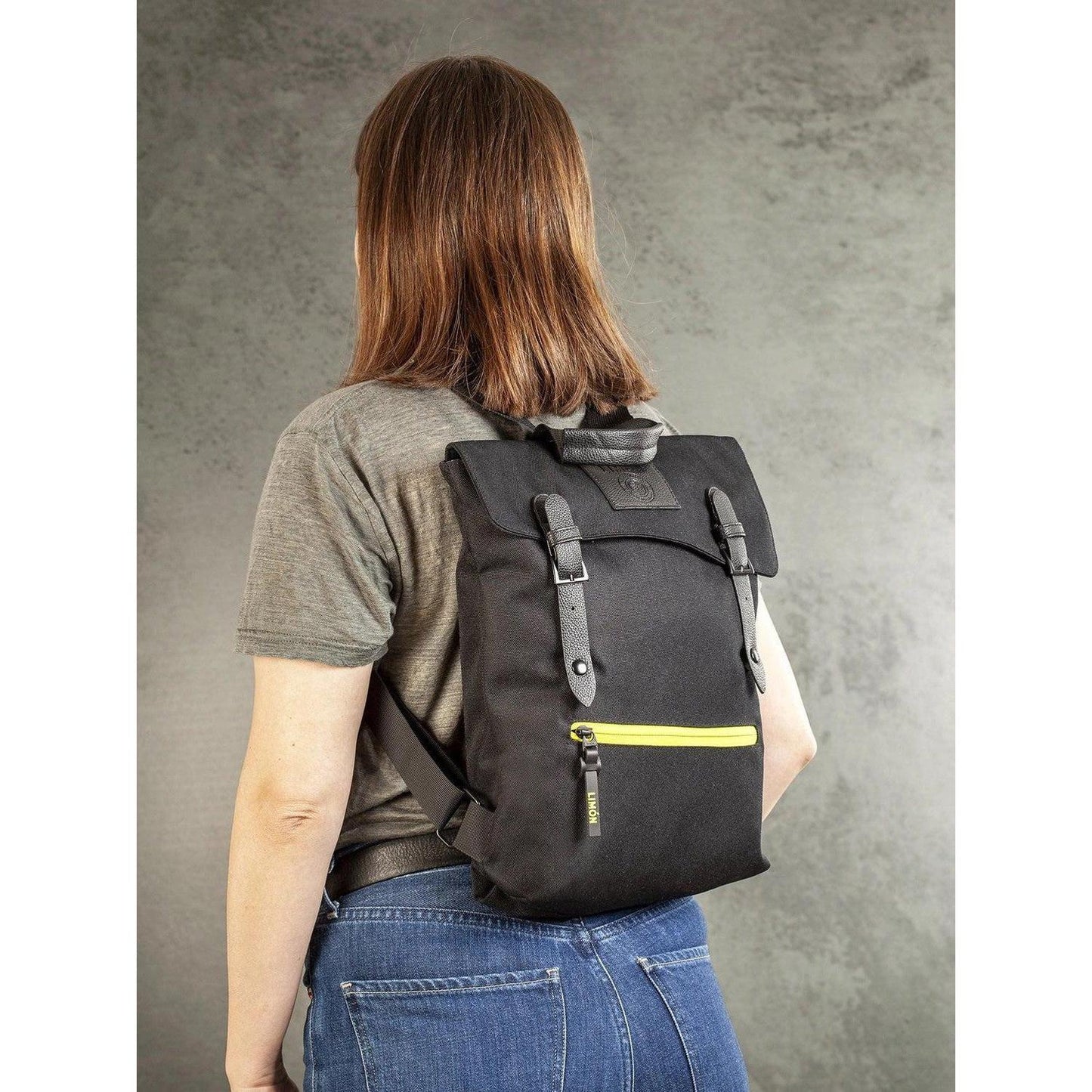 Black Everyday Backpack 9.5L | Ideal for the City Commute - This Vegan-friendly backpack is perfect for everyday use. Made from 69% recycled PET bottles, it has a spacious 9.5L capacity that can hold all your essentials for work or school. With dimensions of 35cm x 8cm x 33cm, it maintains a compact silhouette without compromising on storage. Buy Now at Sacred Remedy