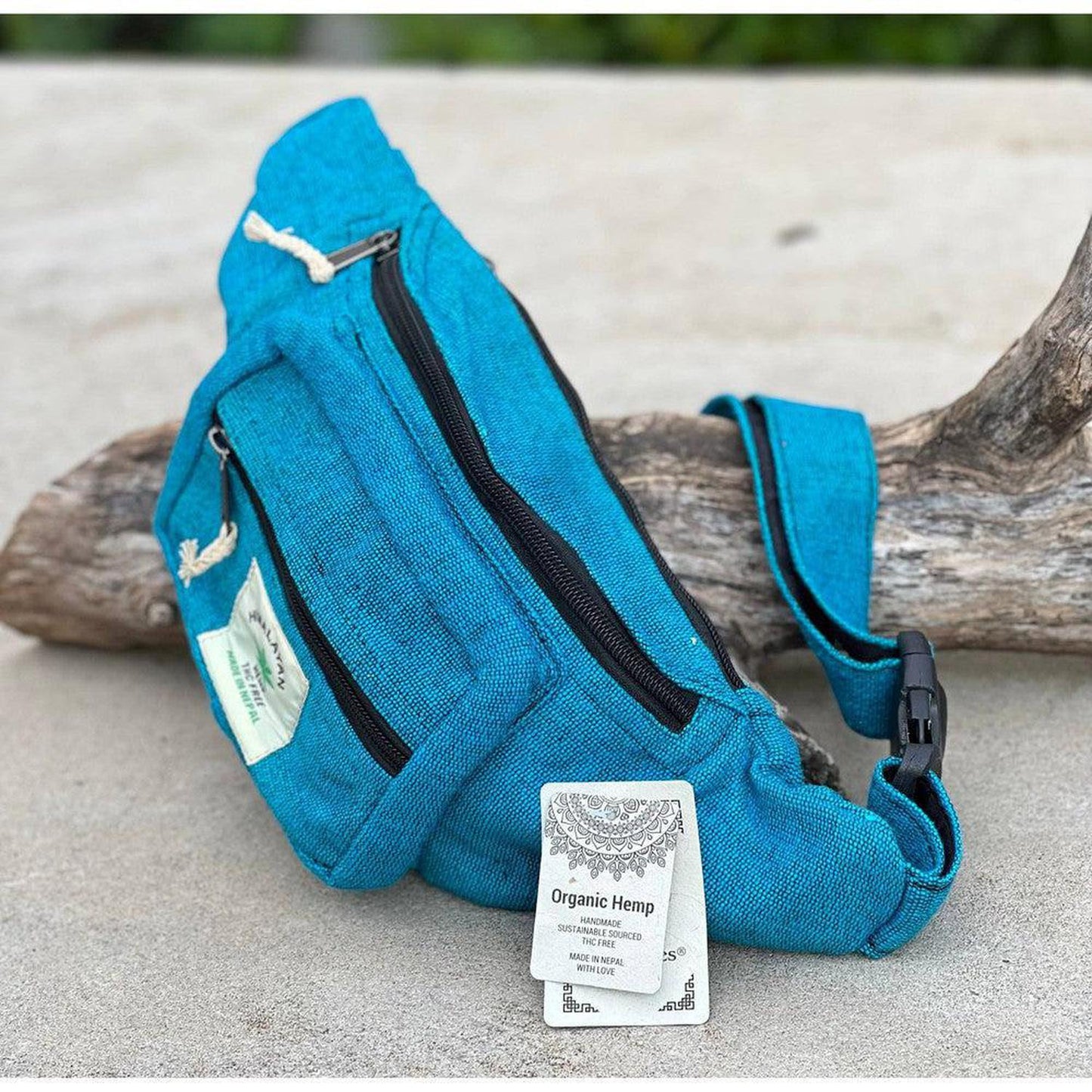 Eco-Friendly Boho Hippie Style Hemp Fanny Pack Hip Waist Bag: Turquoise Blue - Made in Nepal from high-quality, sustainable hemp fabric, our fanny packs are not only durable but also environmentally friendly. Perfect for all your essentials – phone, wallet, keys, passport, etc. Great gift for your loved ones who enjoy activities like travelling, walking, running, hiking, biking, camping etc. Buy Now at Sacred Remedy