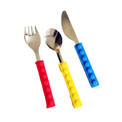 Fun Stacking Cutlery Set for Kids | Independent Eating - Shop the fun, non-toxic stacking cutlery set for kids. Stainless steel knife, fork, and spoon for ages 2-10 to promote independent, confident, and hassle-free eating. Buy Now at Sacred Remedy