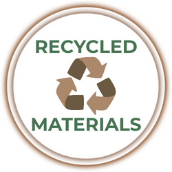 A circular badge with a brown border and a white center featuring the words 'RECYCLED MATERIALS' in green text around a brown recycling symbol.