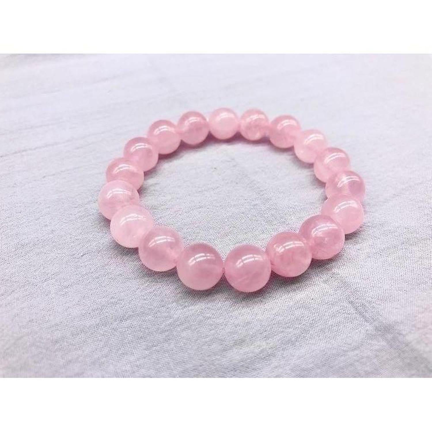 Natural Rose Quartz Bracelet | Stone of Love & Emotional Healing - Shop the Rose Quartz Bracelet with 10mm beads. The Stone of Love promotes self-love, healing, inner peace, and attracts positive relationships. Ideal crystal jewellery. Buy Now at Sacred Remedy