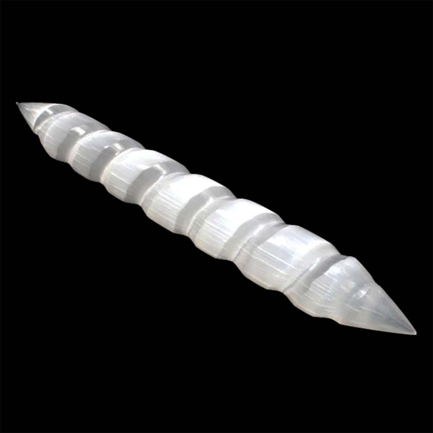 Selenite Spiral Double Point Massage Wand | Aura Combing - It is generally accepted that Selenite is one of the most powerful crystals for healing. Also it is connecting to the third eye, crown and etheric chakras. Some say it promotes purity and honesty. It is said it forces the person holding it to be honest with themselves. Buy Now at Sacred Remedy