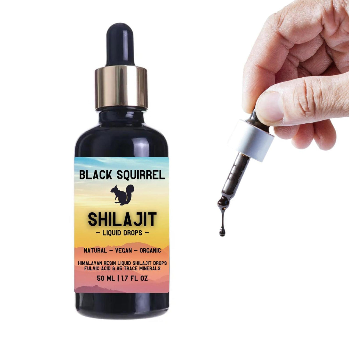 Black Squirrel 50ml Shilajit liquid drops in a dark glass bottle with a dropper held by a hand, showing a dark resin drip.