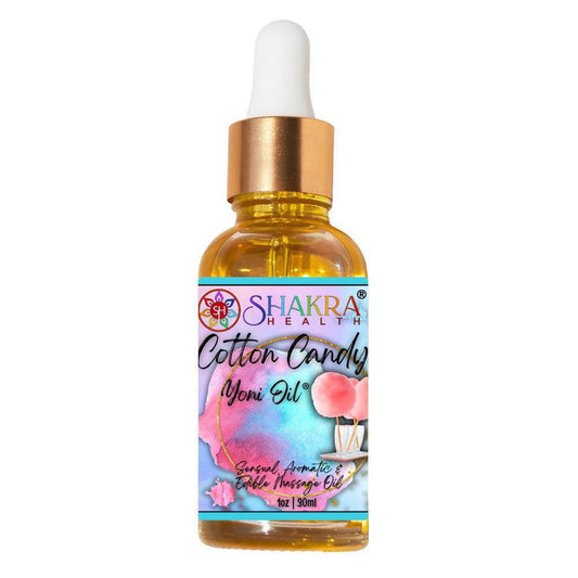 30ml bottle of Shakra Health Cotton Candy yoni oil with a gold dropper cap and colorful, whimsical label design.