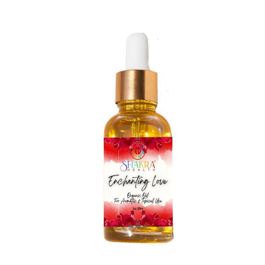 Enchanting Love ritual oil in a 30ml glass dropper bottle with a gold cap and a floral red and white label.