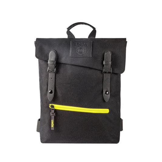 Sleek black 9.5L everyday backpack with a fold-over flap, faux leather straps, and a vibrant yellow zippered front pocket.