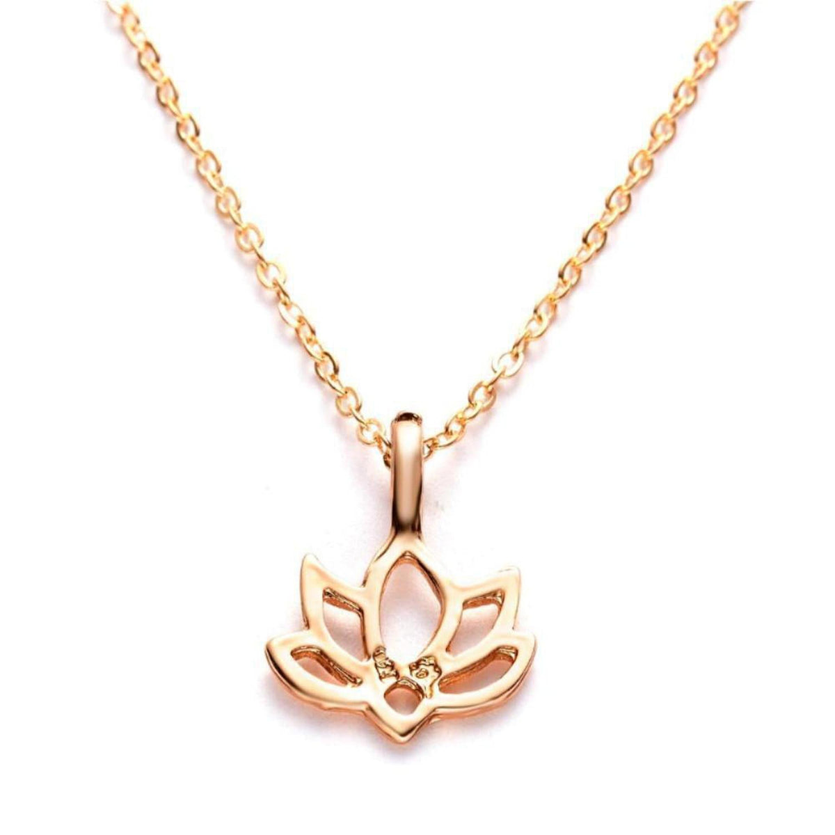 Minimalist gold lotus flower pendant necklace on a delicate matching chain against a white background.
