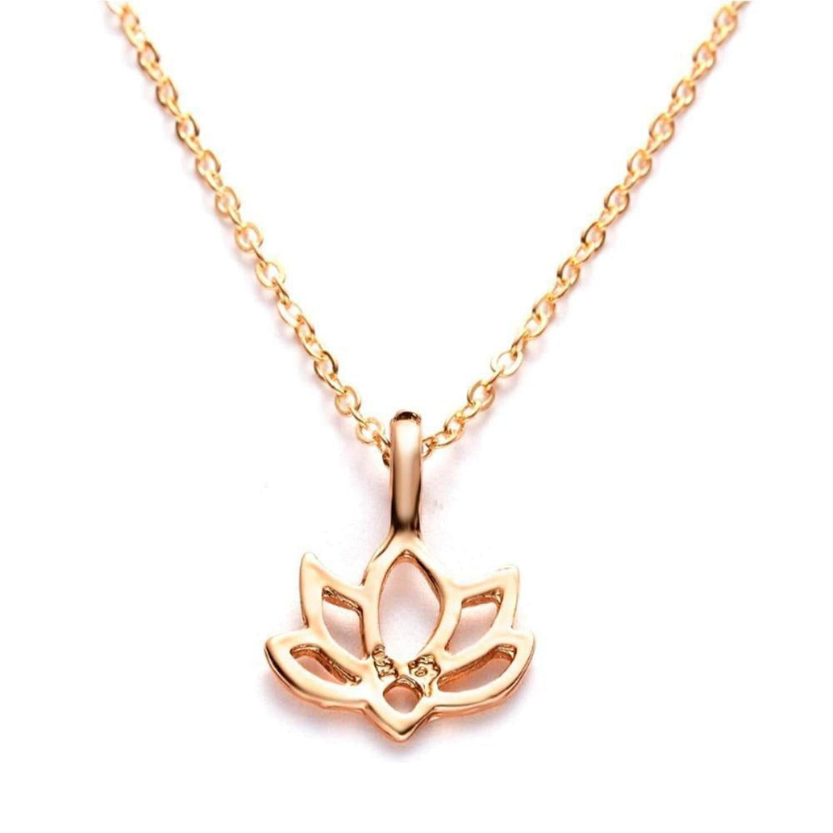 Minimalist gold-toned lotus flower pendant necklace on a delicate matching chain against a white background.