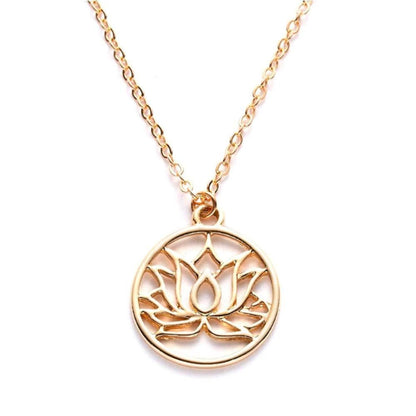 Gold lotus flower pendant necklace on a delicate chain, featuring a minimalist circular cutout design.