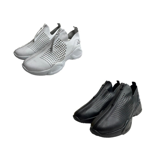 White and black genuine leather Harmony sneakers featuring a front zip closure and perforated breathable design.