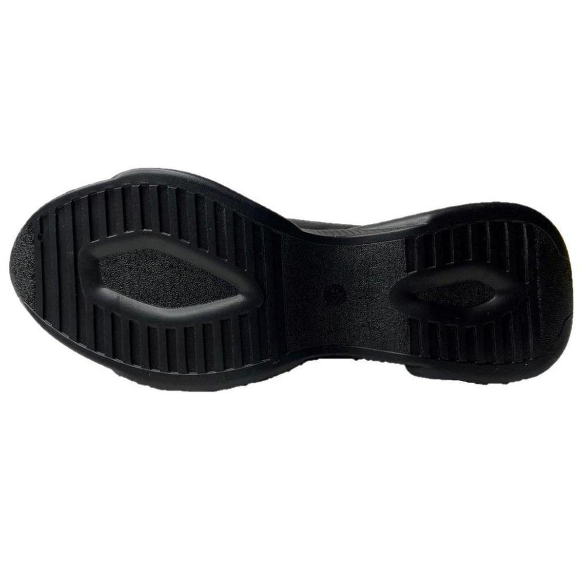 Black Harmony sneaker showing the textured, slip-resistant rubber outsole with a grooved tread pattern.