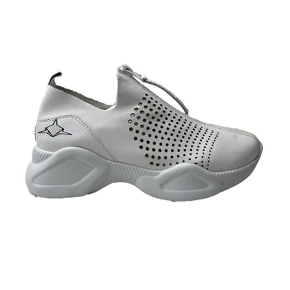 White leather Harmony sneakers with a front zip closure, perforated side panels, and a chunky, supportive platform sole.
