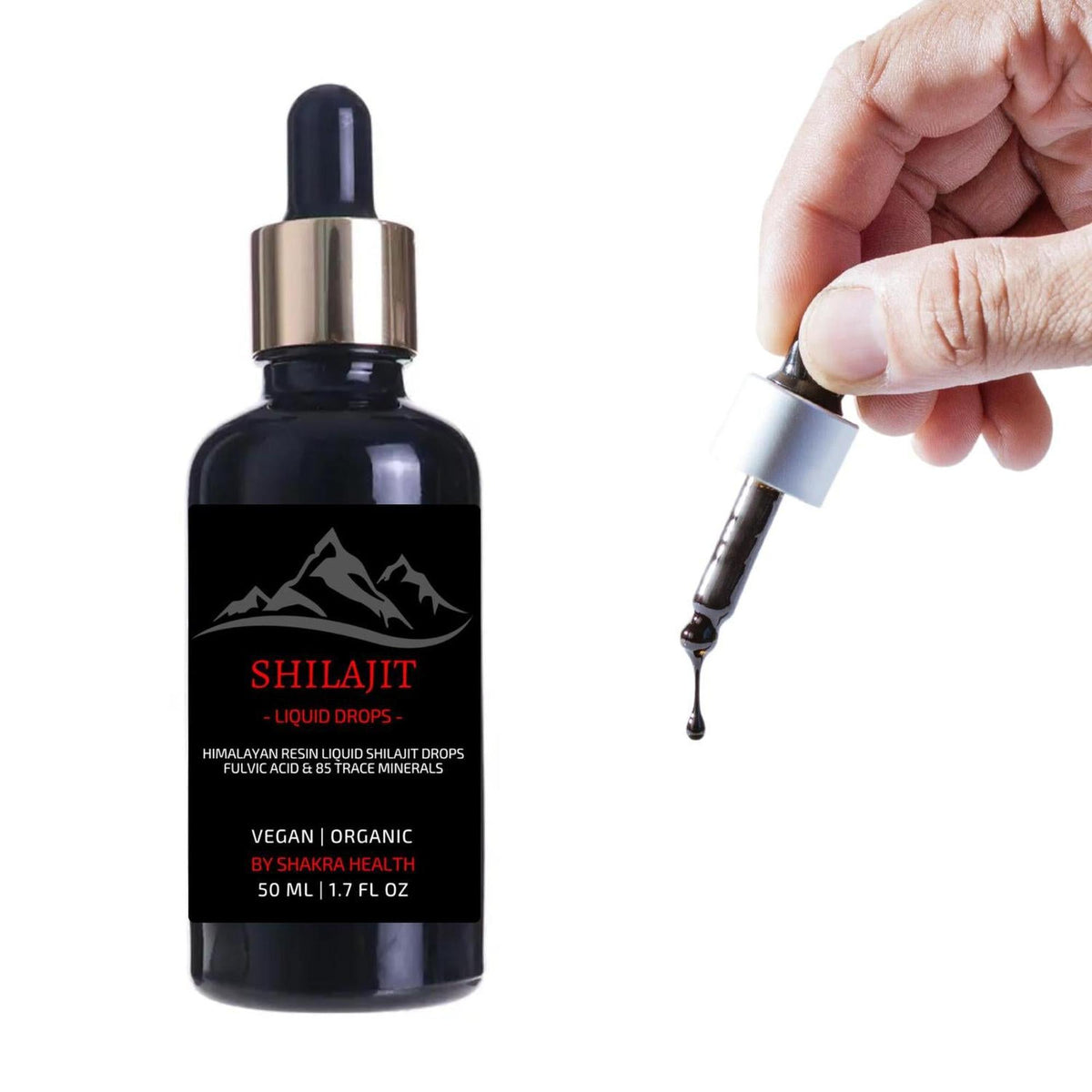 Hand holding a glass dropper dispensing dark Himalayan Shilajit liquid next to a 50ml amber bottle with mountain label.
