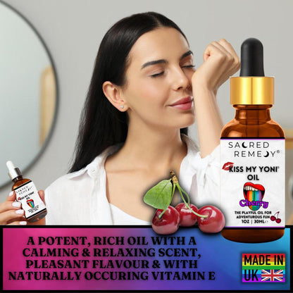 Woman smelling cherry-scented Kiss My Yoni oil in a 30ml amber dropper bottle with botanical label design.