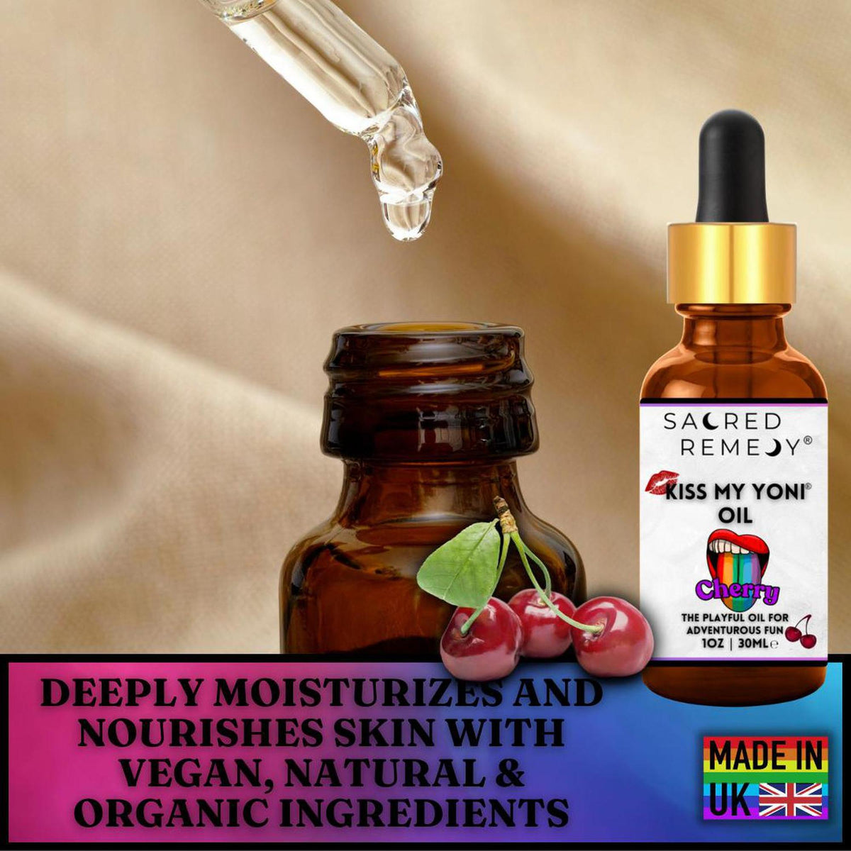 Amber glass dropper bottle of Kiss My Yoni Cherry oil with fresh cherries and a golden silk background.