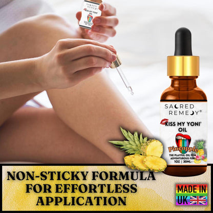 Amber glass dropper bottle of Pineapple Kiss My Yoni Oil with botanical label, shown with fresh pineapple slices.