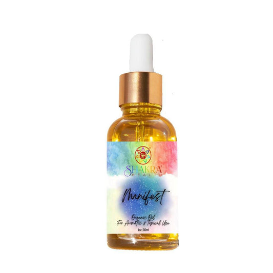 30ml amber glass dropper bottle of Manifest Ritual Oil with a colorful watercolor label and gold cap.