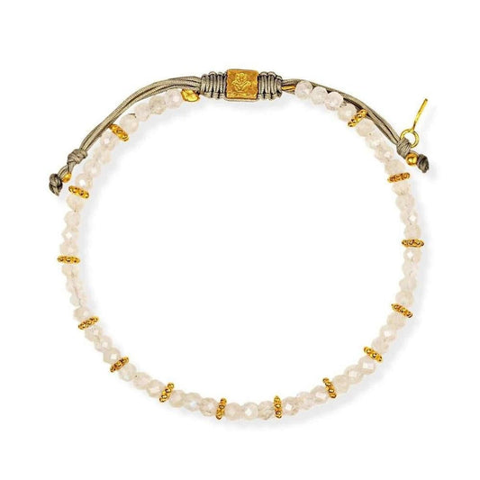 Handmade bracelet with faceted moonstone beads, gold-toned accents, and a grey adjustable cord closure.