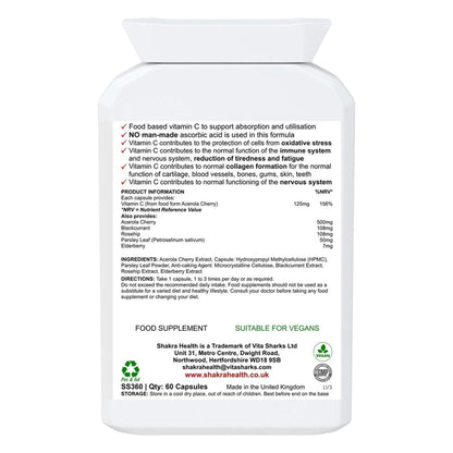 White plastic supplement bottle showing a detailed ingredient label for Natural Fruit and Herb Vitamin C capsules.
