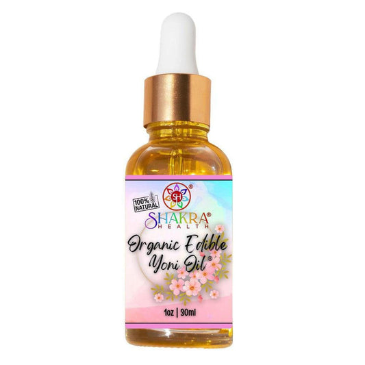 30ml glass dropper bottle of Shakra Health organic edible yoni oil with a gold cap and floral label on white background.