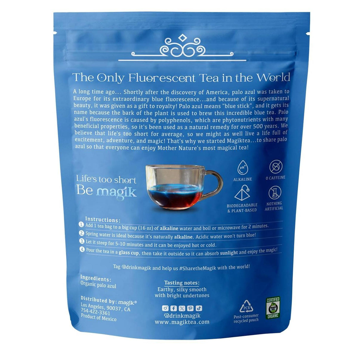 Blue pouch of Palo Azul tea featuring a glass cup of glowing fluorescent blue herbal tea and brewing instructions.
