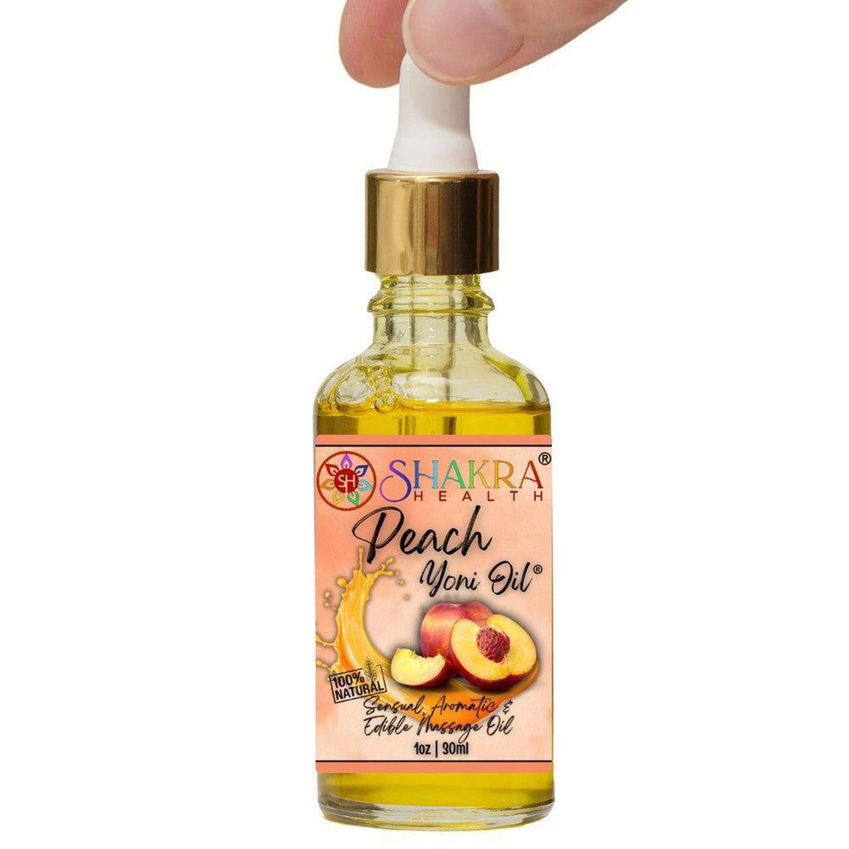 30ml glass dropper bottle of Shakra Health peach yoni oil with a gold cap and peach-themed label on a white background.