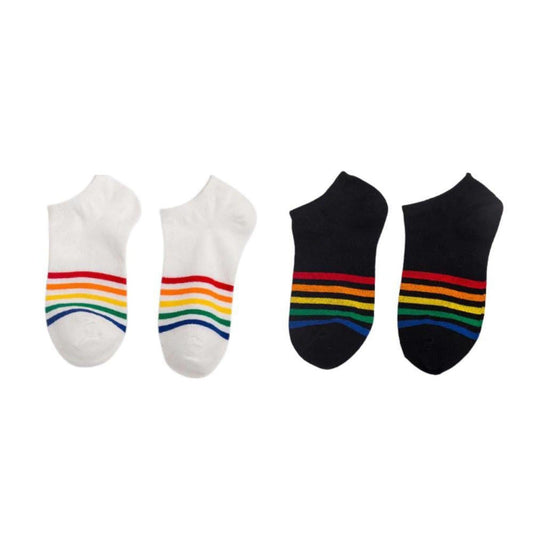 Two pairs of white and black cotton ankle socks featuring vibrant rainbow stripes on the cuffs.