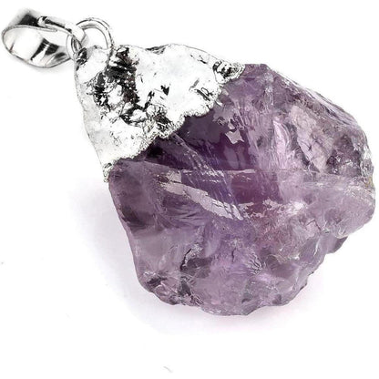 Raw purple amethyst crystal pendant with a silver cap and bail on a white background.