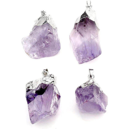 Four raw, irregular purple amethyst crystal pendants with silver-toned metal caps on a white background.