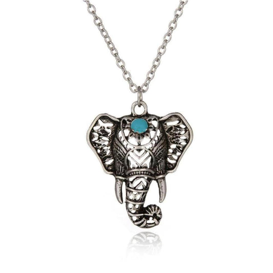 Antique silver-plated elephant pendant necklace featuring intricate filigree details and a central mystic blue stone.