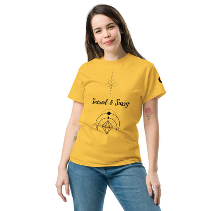 Woman wearing a yellow cotton unisex t-shirt featuring a black Sacred & Sassy lotus and geometric graphic design.