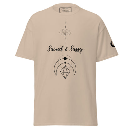 Beige unisex cotton t-shirt featuring a black lotus, geometric moon, and Sacred & Sassy text graphic.