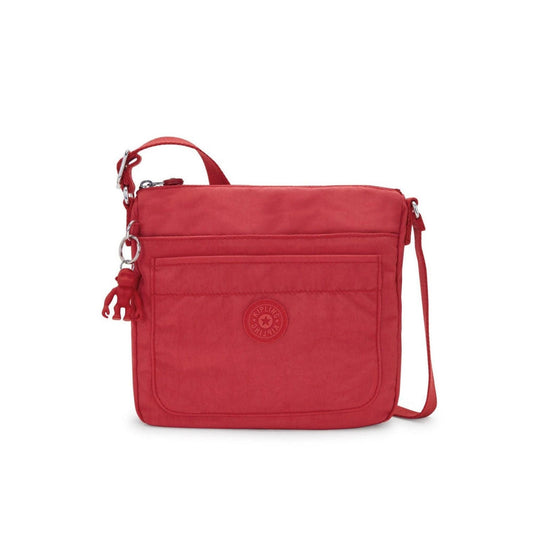 Kipling Sebastian medium crossbody bag in vibrant Party Pink with a front zip pocket and signature monkey keychain.