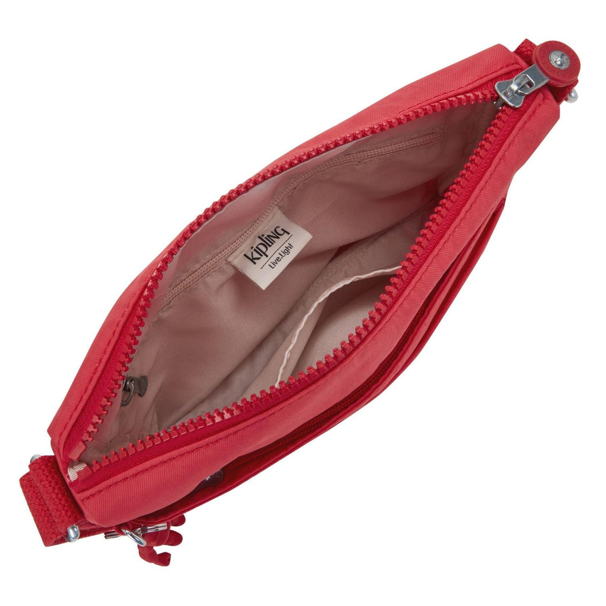 Open interior of a Party Pink Kipling Sebastian medium crossbody bag showing organized pockets and branded lining.