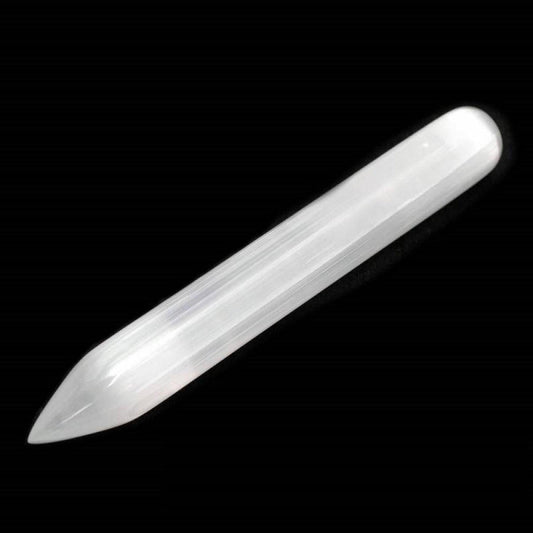 Smooth, translucent white selenite crystal wand with a pointed tip against a black background.
