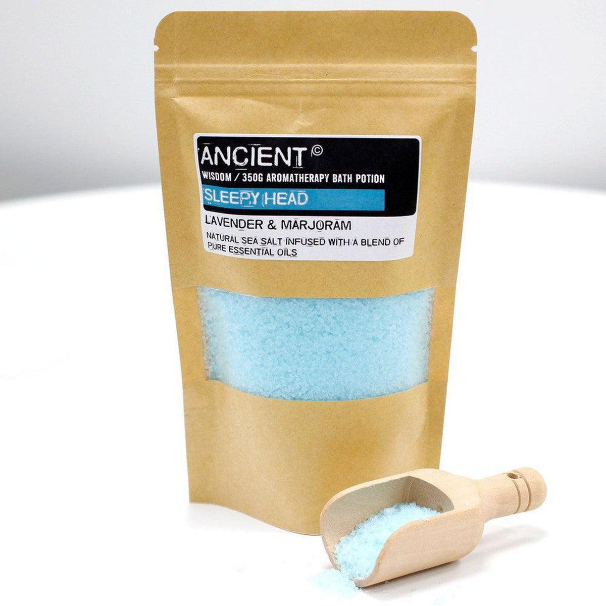 350g Sleepy Head aromatherapy bath salt in a brown kraft pouch with a blue salt window and a wooden scoop.
