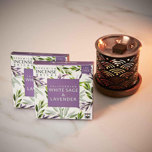 Copper incense burner with a tea light and two boxes of Californian White Sage and Lavender aromatic bricks.