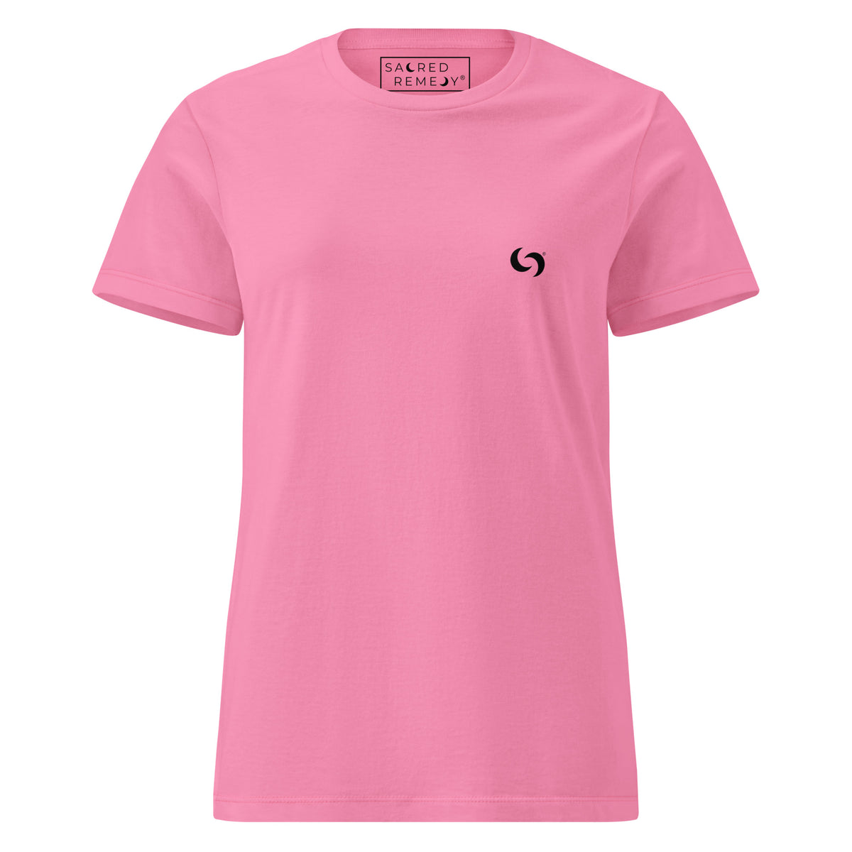 Soft pink semi-fitted cotton t-shirt with a small black spiral logo on the chest and Sacred Remedy branding inside.